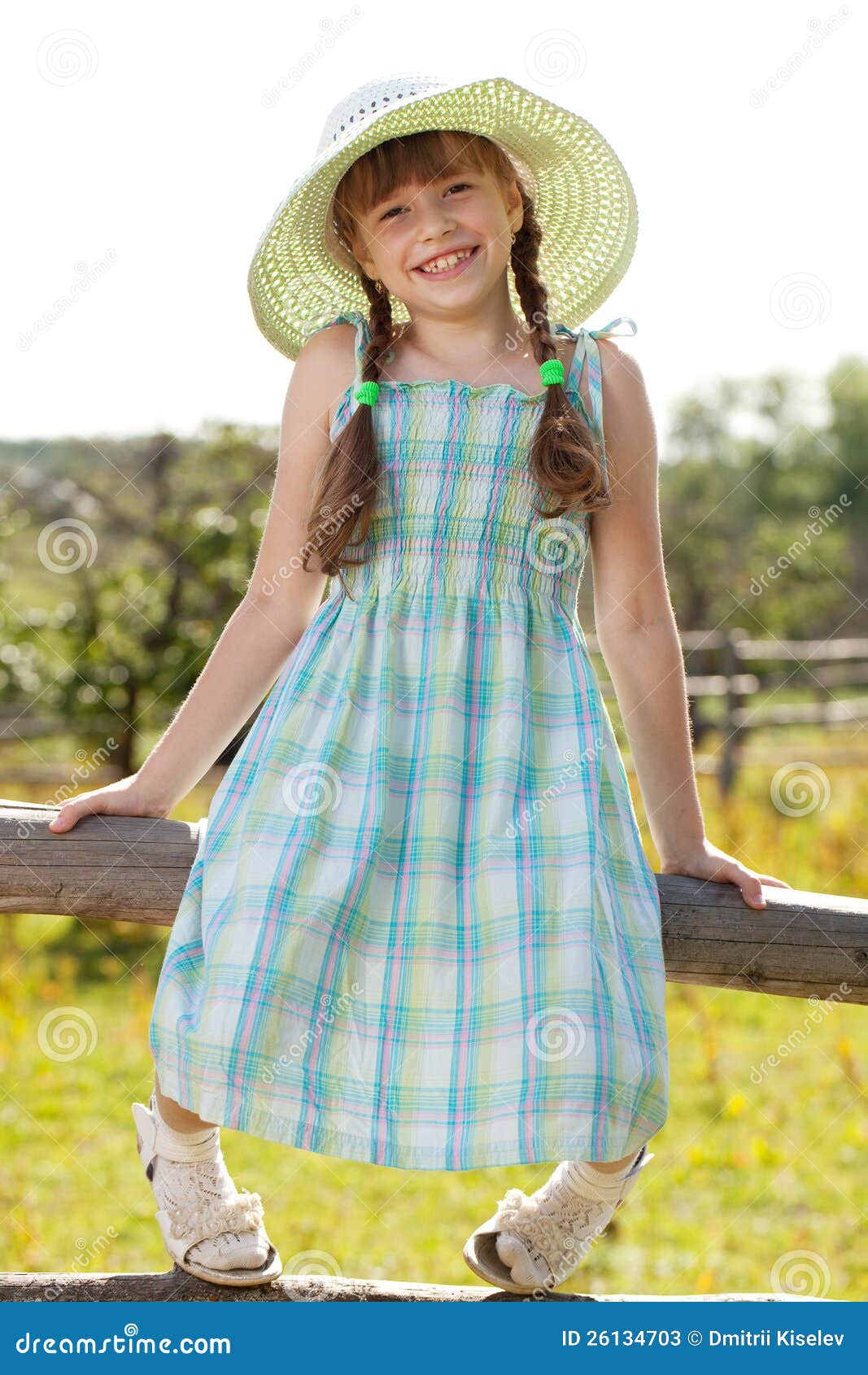 Girl in a dress and hat stock image. Image of happy, charming 26134703