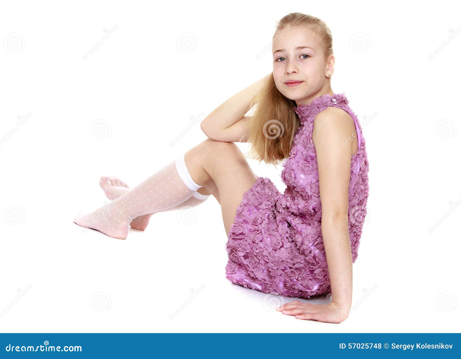 Girl in Dress and Stockings is Sitting on the Stock Photo - Image