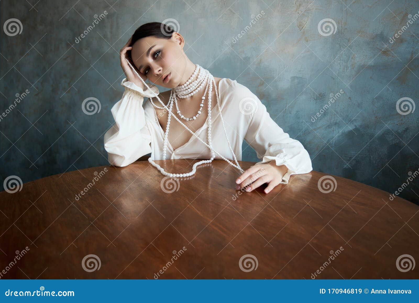 Girl Dressed In White Boho Clothing With White Pearl Beads ...