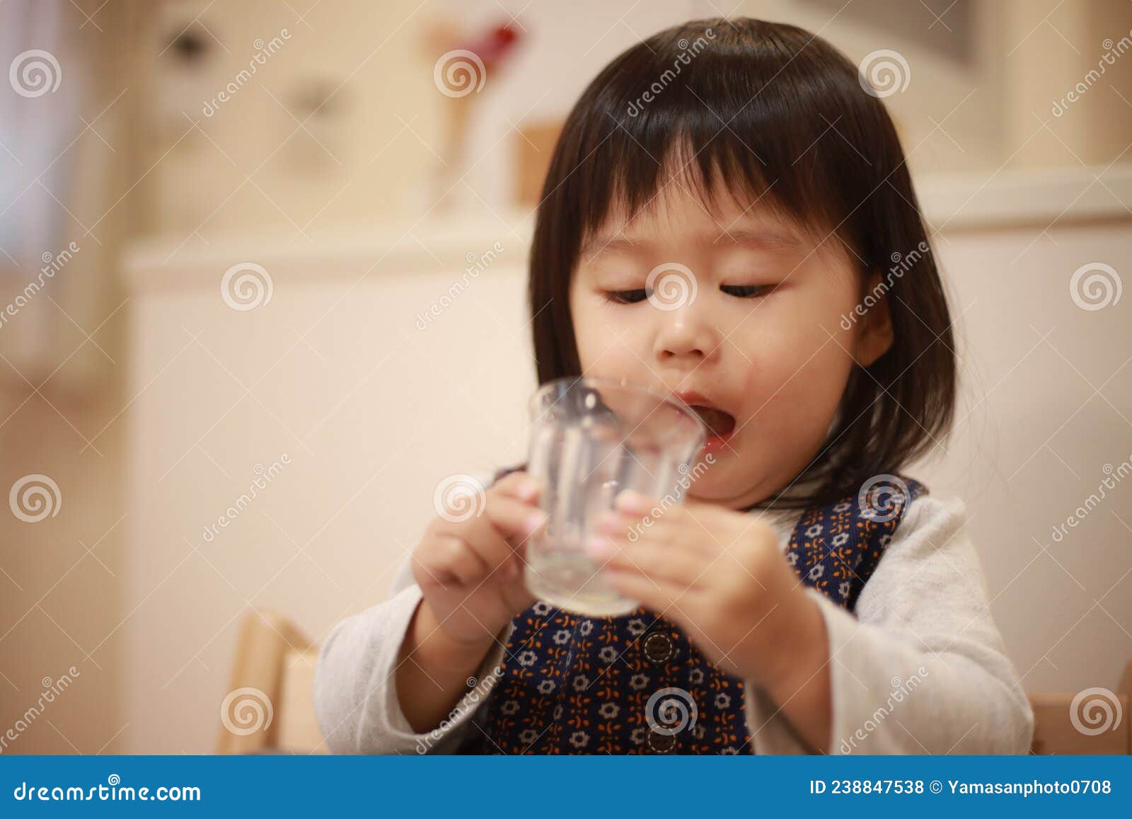 Girl Drinking Juice with a Glass Stock Photo Image of child