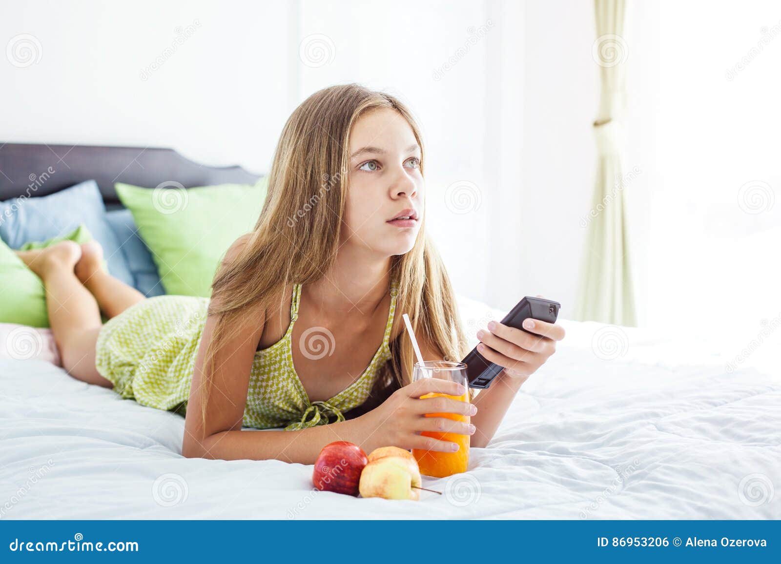 Girl Drinking Juice And Watching  Tv  In Bedroom Stock Photo Image of lifestyle healthy 86953206