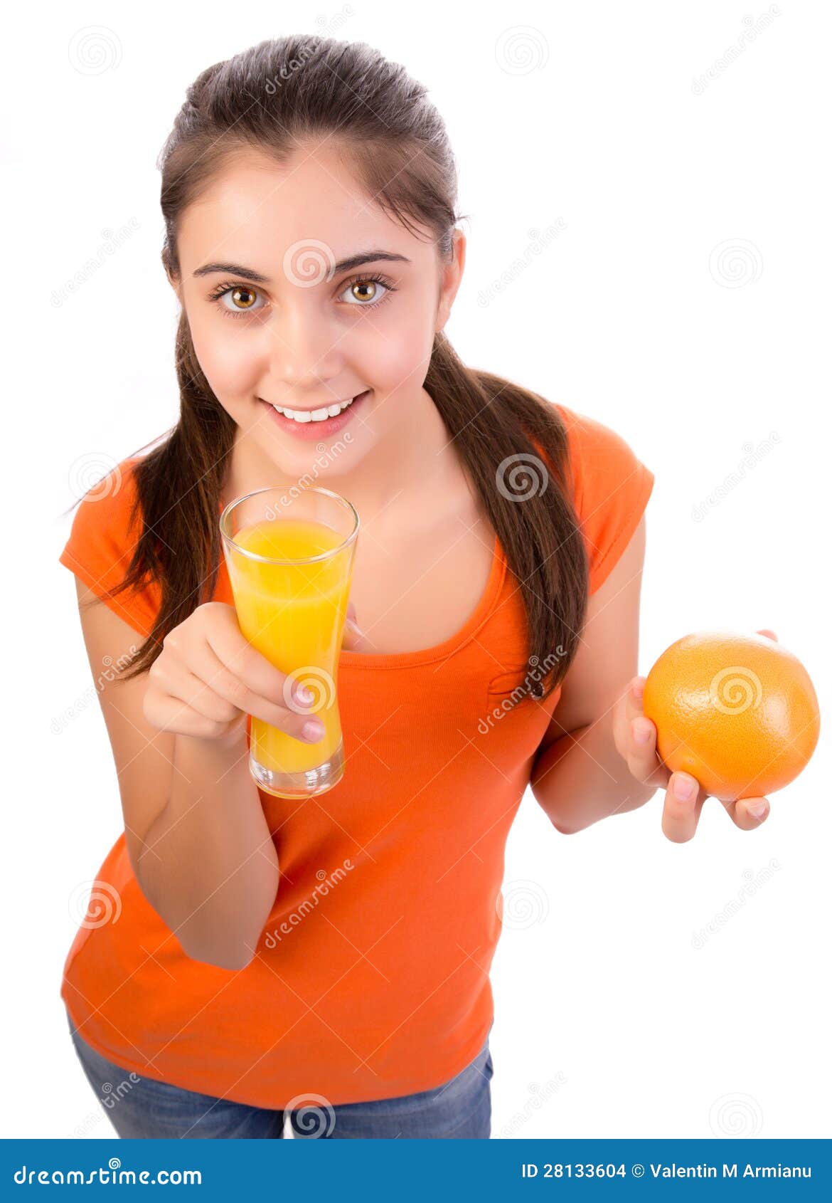 Girl drinking orange juice stock photo. Image of portrait 28133604