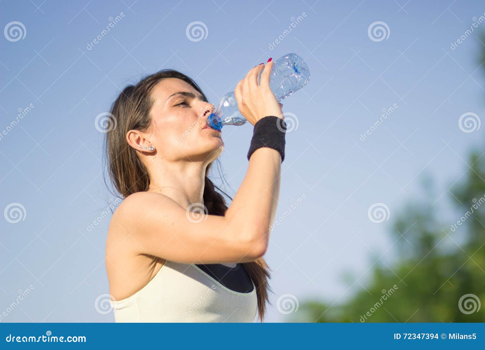 Girl Drinking Water Bottle. Stock Photo Image of caucasian, young