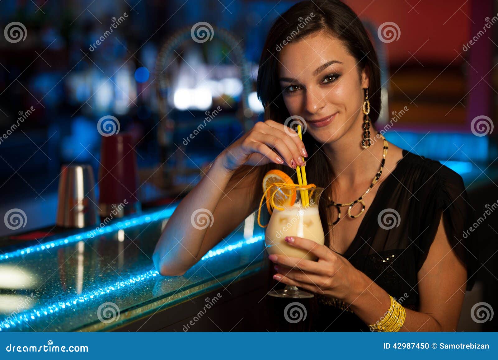 Girl Drinks a Cocktail in Night Club Stock Photo Image of evening