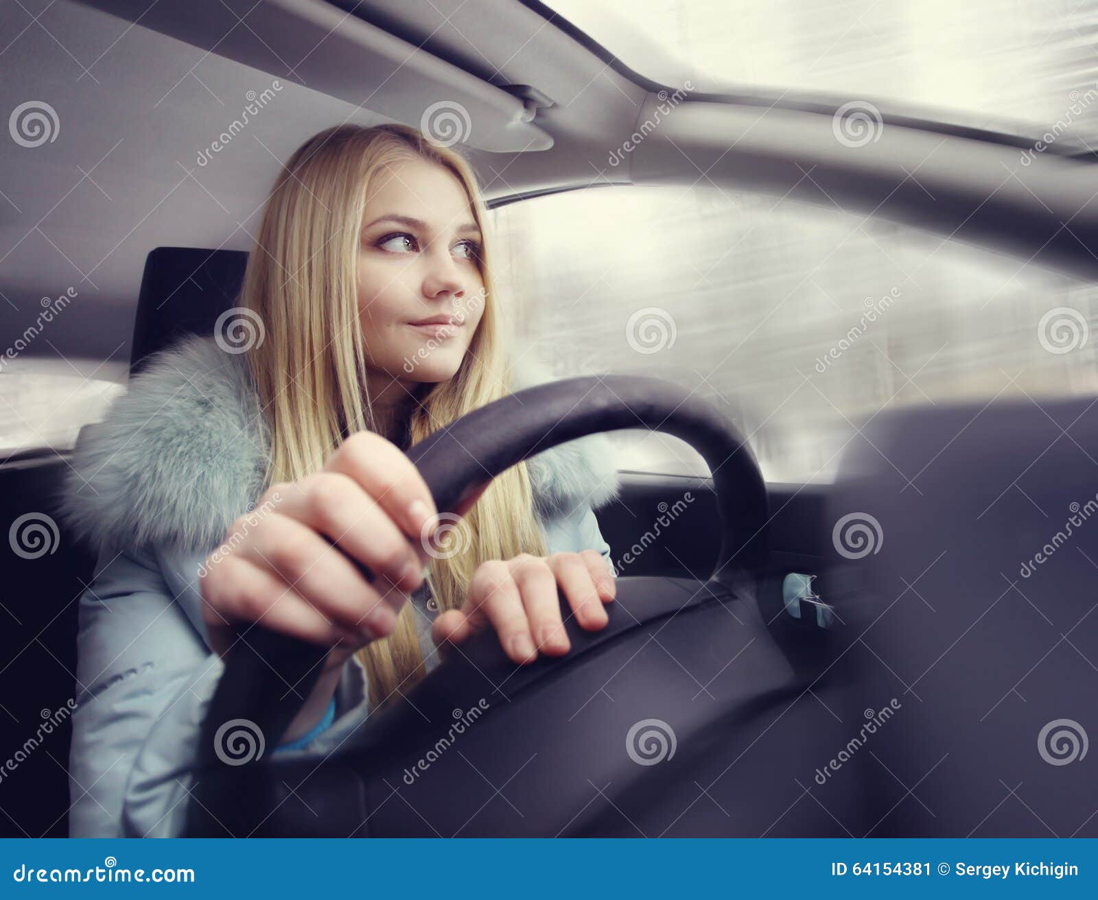 Girl driving a car stock image. Image of behind, adult