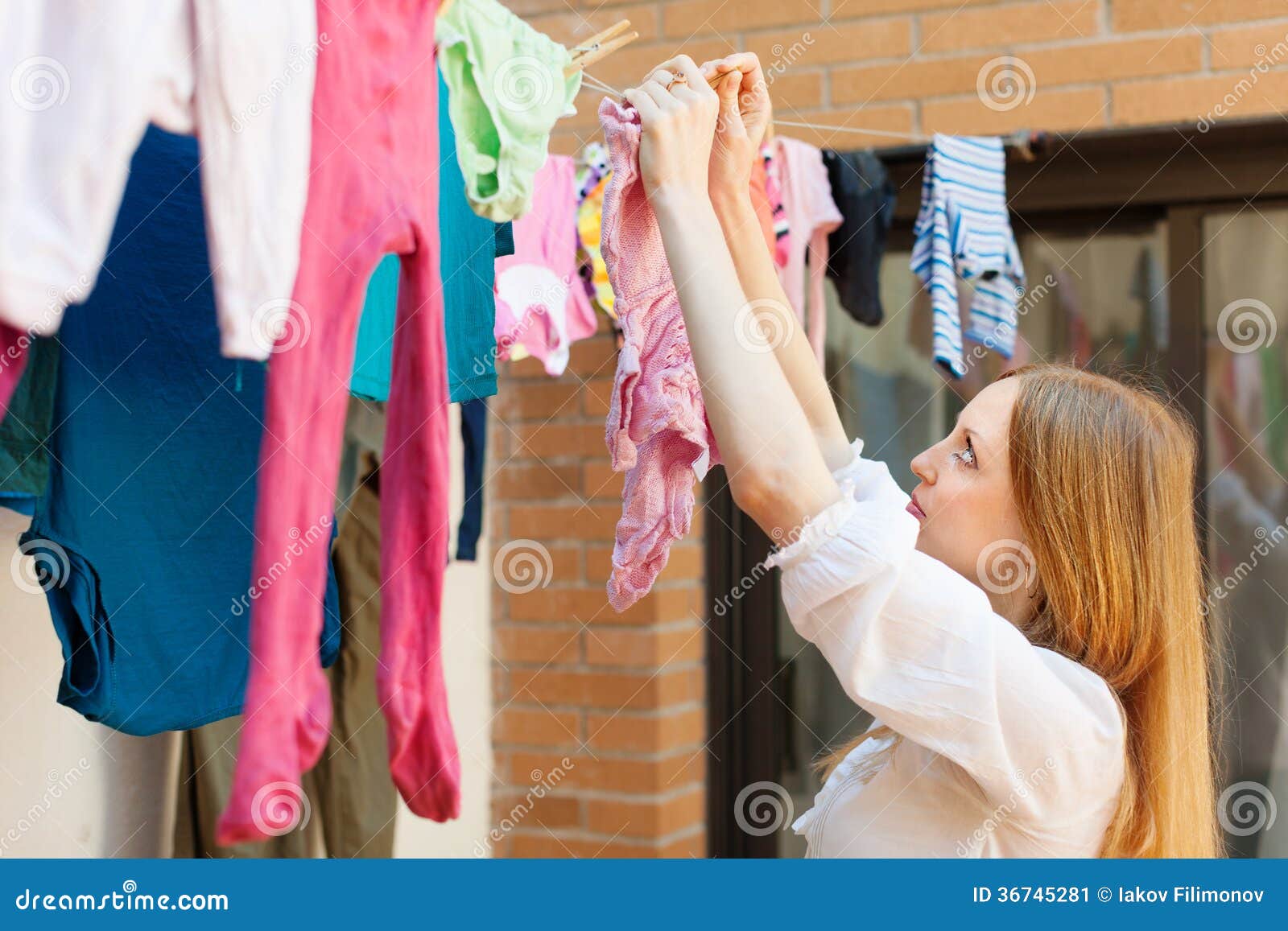 Girl Drying Clothes after Laundry Stock Image Image of drying