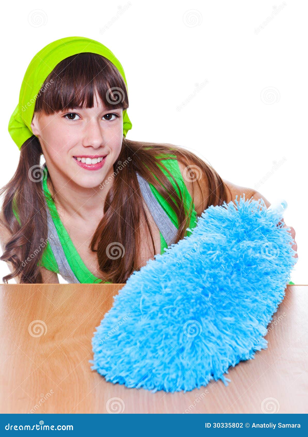 Girl with a duster stock photo. Image of happy, blue 30335802
