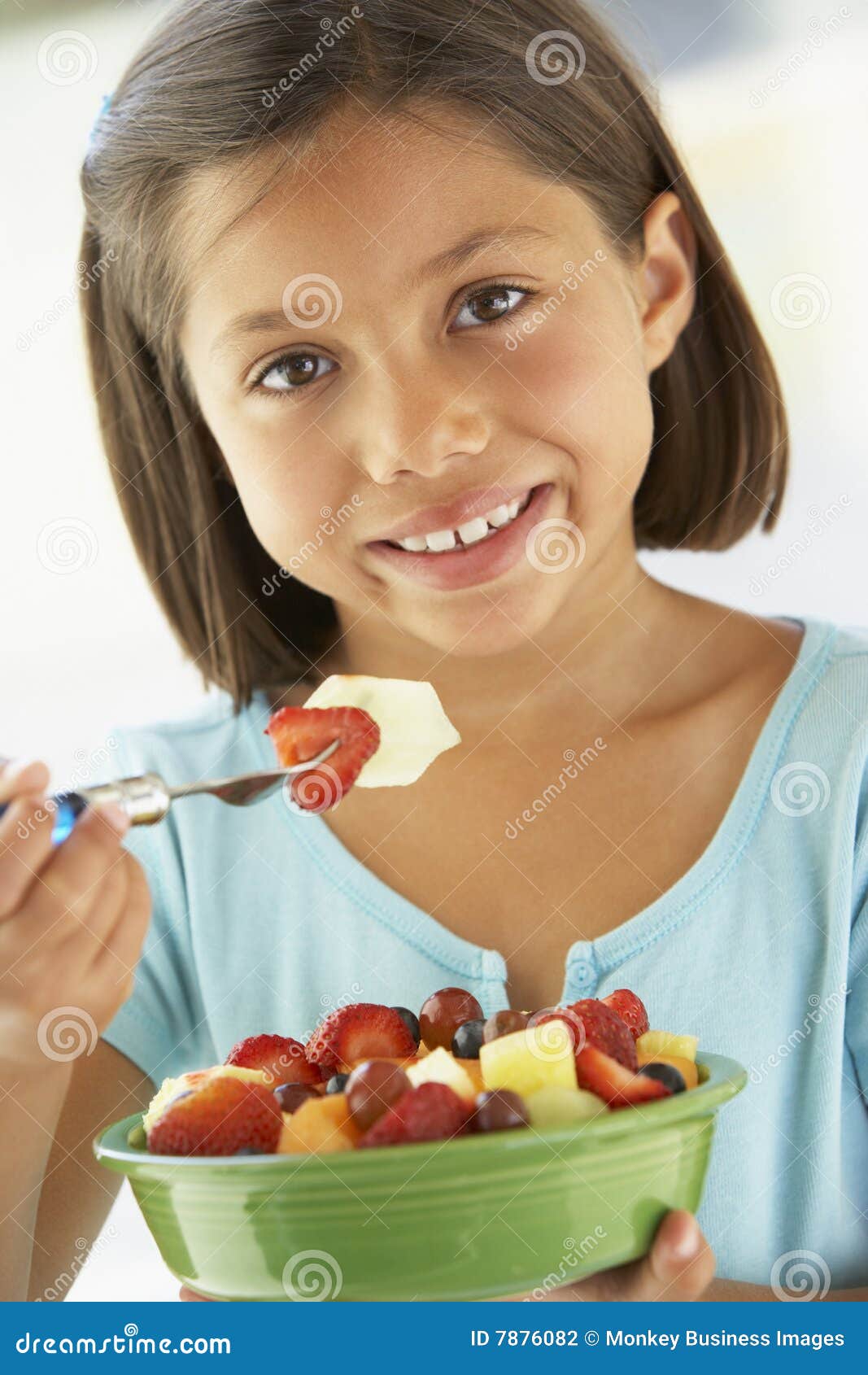 Girl Eating a Bowl of Fresh Fruit Salad Stock Photo Image of latin