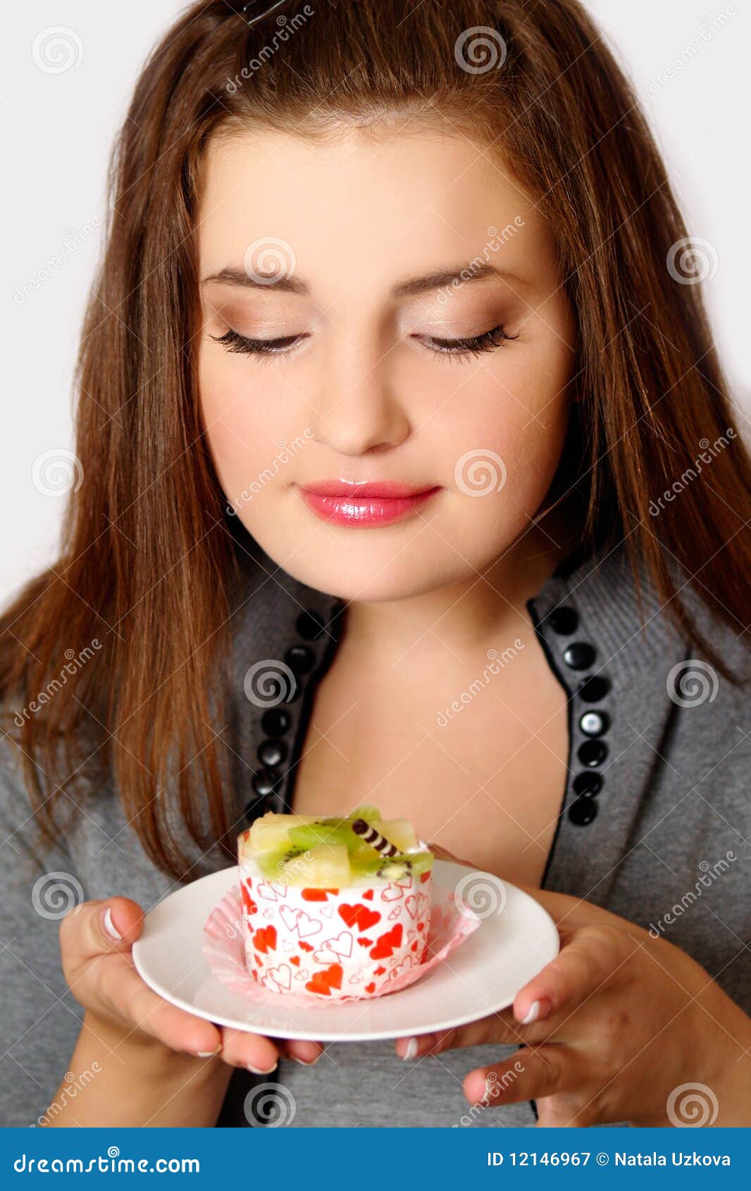 Girl eating cake stock image. Image of fresh, isolated 12146967