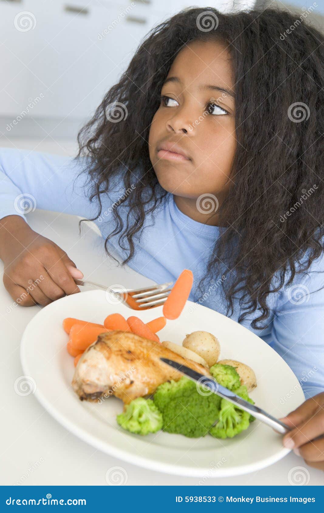 Girl Eating Chicken and Vegetable Dinner at Home Stock Image Image of