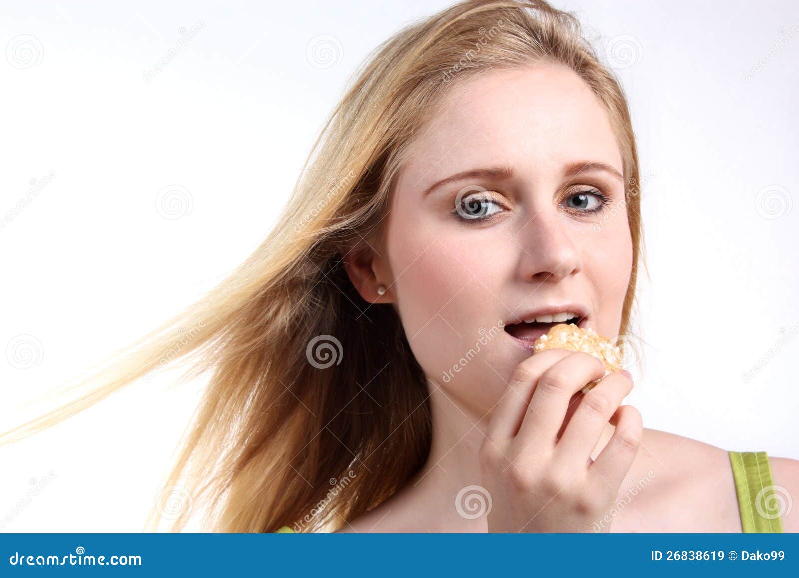 Girl eating a cookie stock image. Image of cake, cakes 26838619