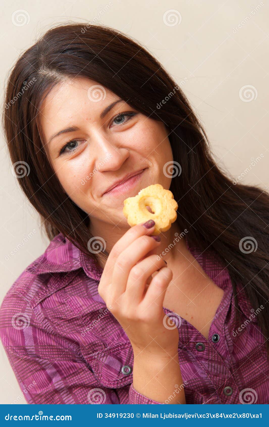 Girl Eating Cookie stock photo. Image of enjoy, woman 34919230