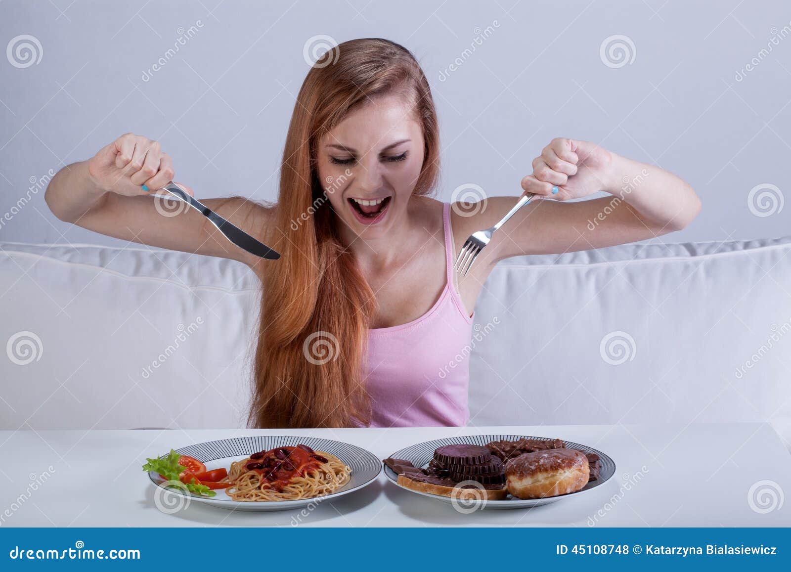 girl eating a lot of food at once
