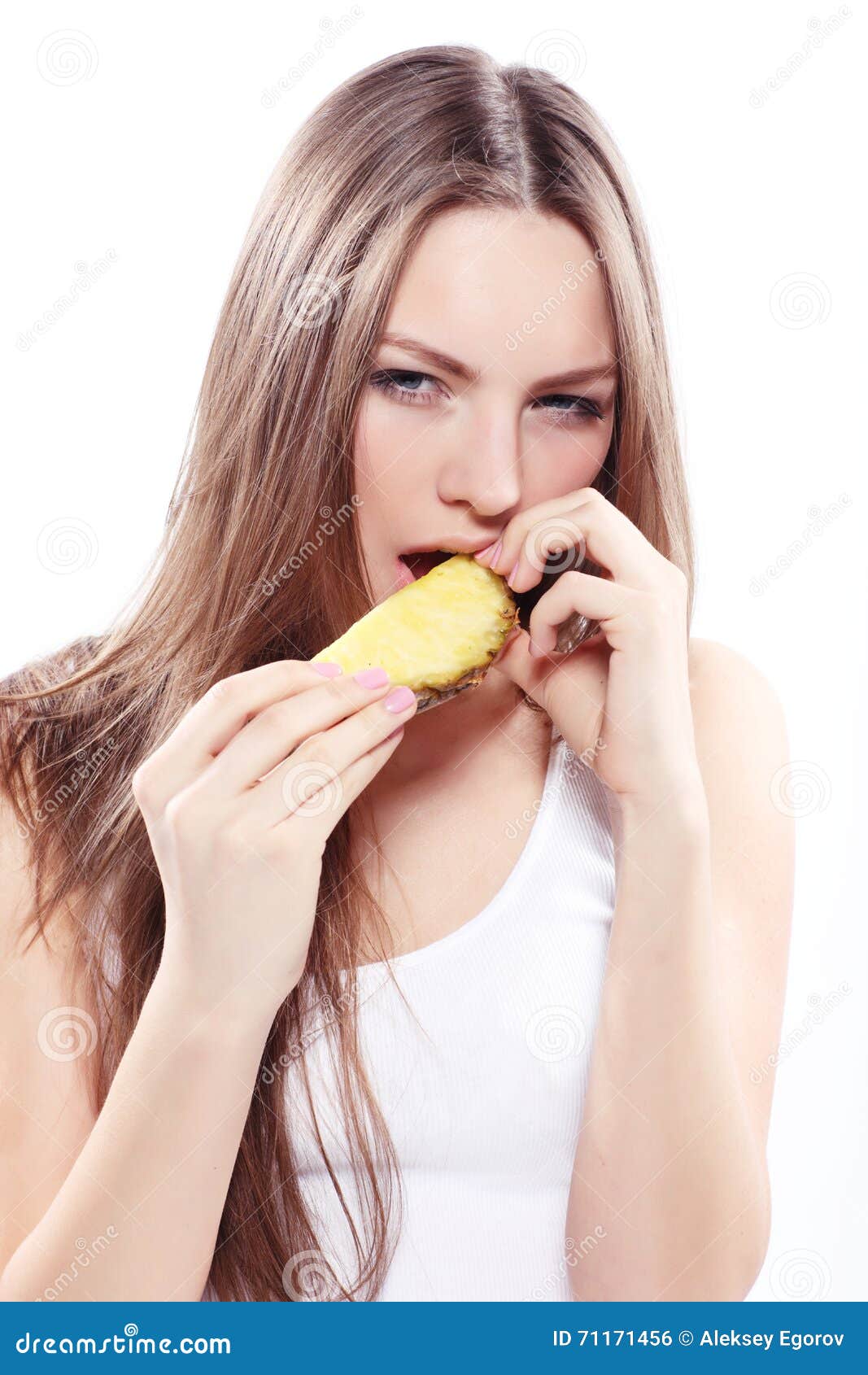 Girl eating a pineapple stock photo. Image of eating 71171456