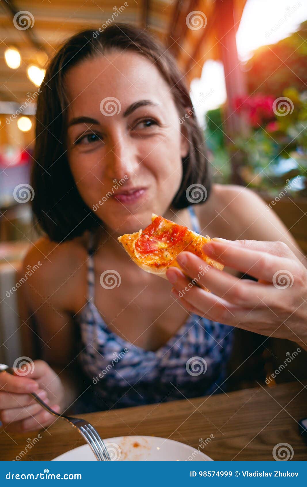 The Girl Is Eating Pizza Stock Im