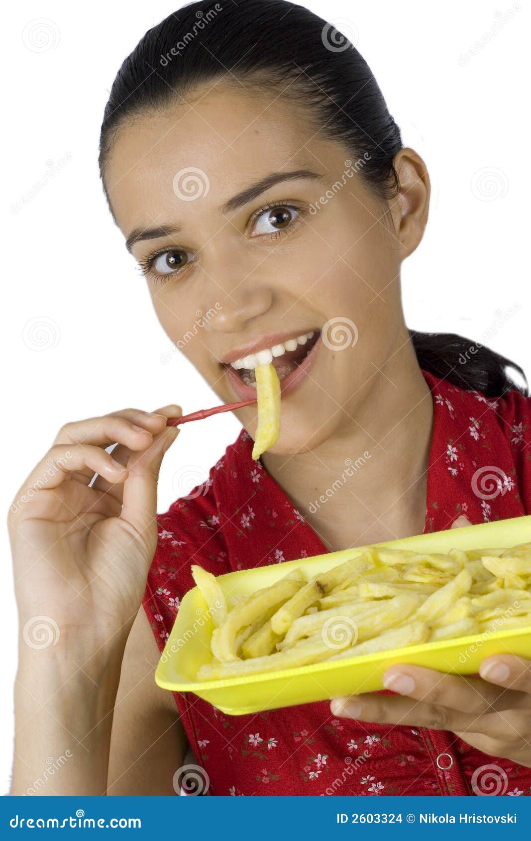 Girl eating potatoes stock photo. Image of meat, color 2603324