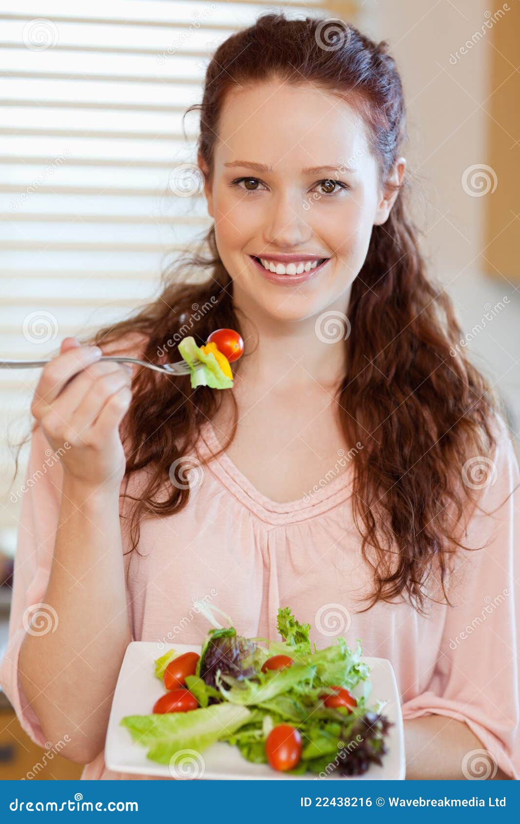 Girl eating salad stock photo. Image of indoors, house 22438216