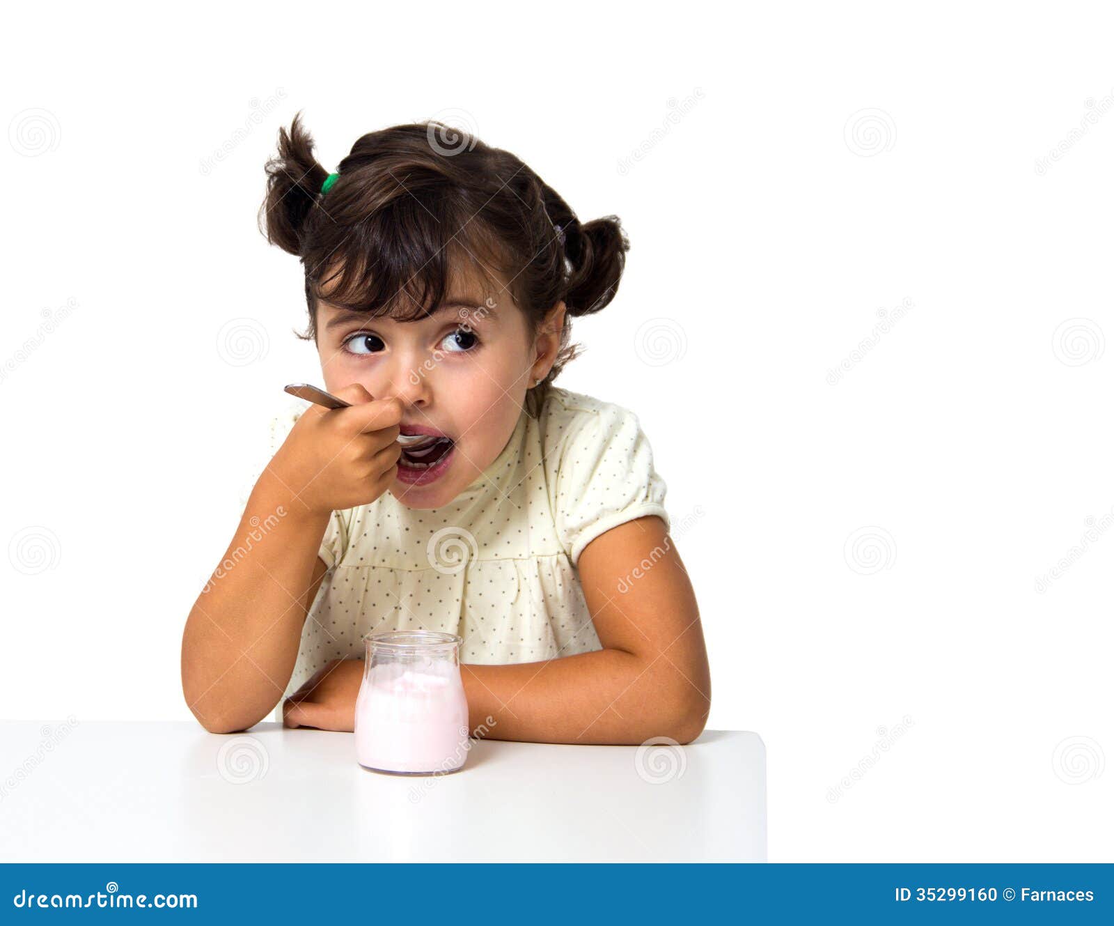 Girl eating yogurt stock photo. Image of eating, hungry - 35299160