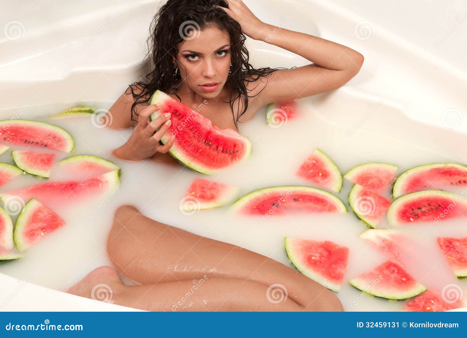 Girl Enjoys A Bath With Milk And Watermelon. Stock Photo 32459131 - Megapixl