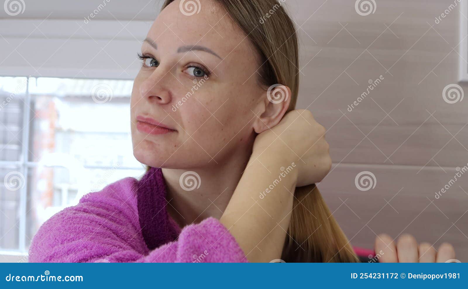 A Girl Of European Appearance With Blond Hair Close Up Of Her Face