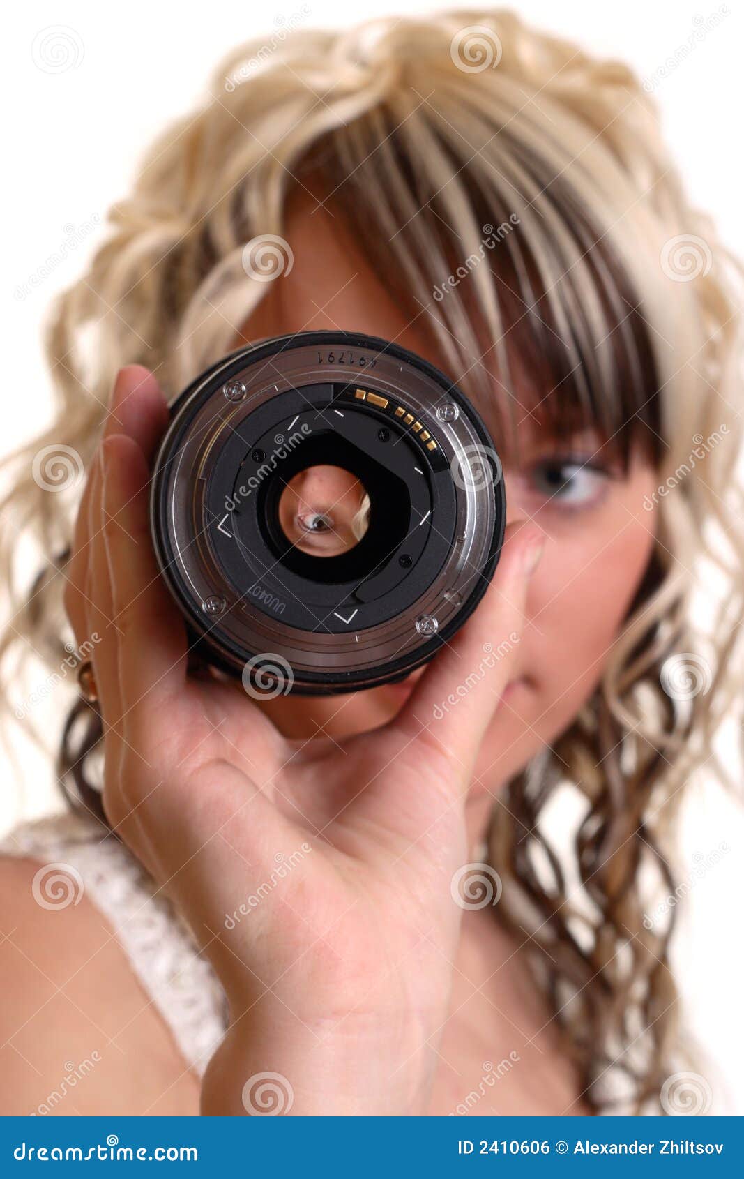 girl examine lense