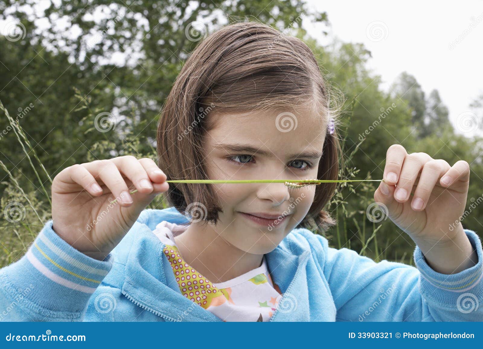 Girl Examining Caterpillar on Grass Stock Image Image of activity