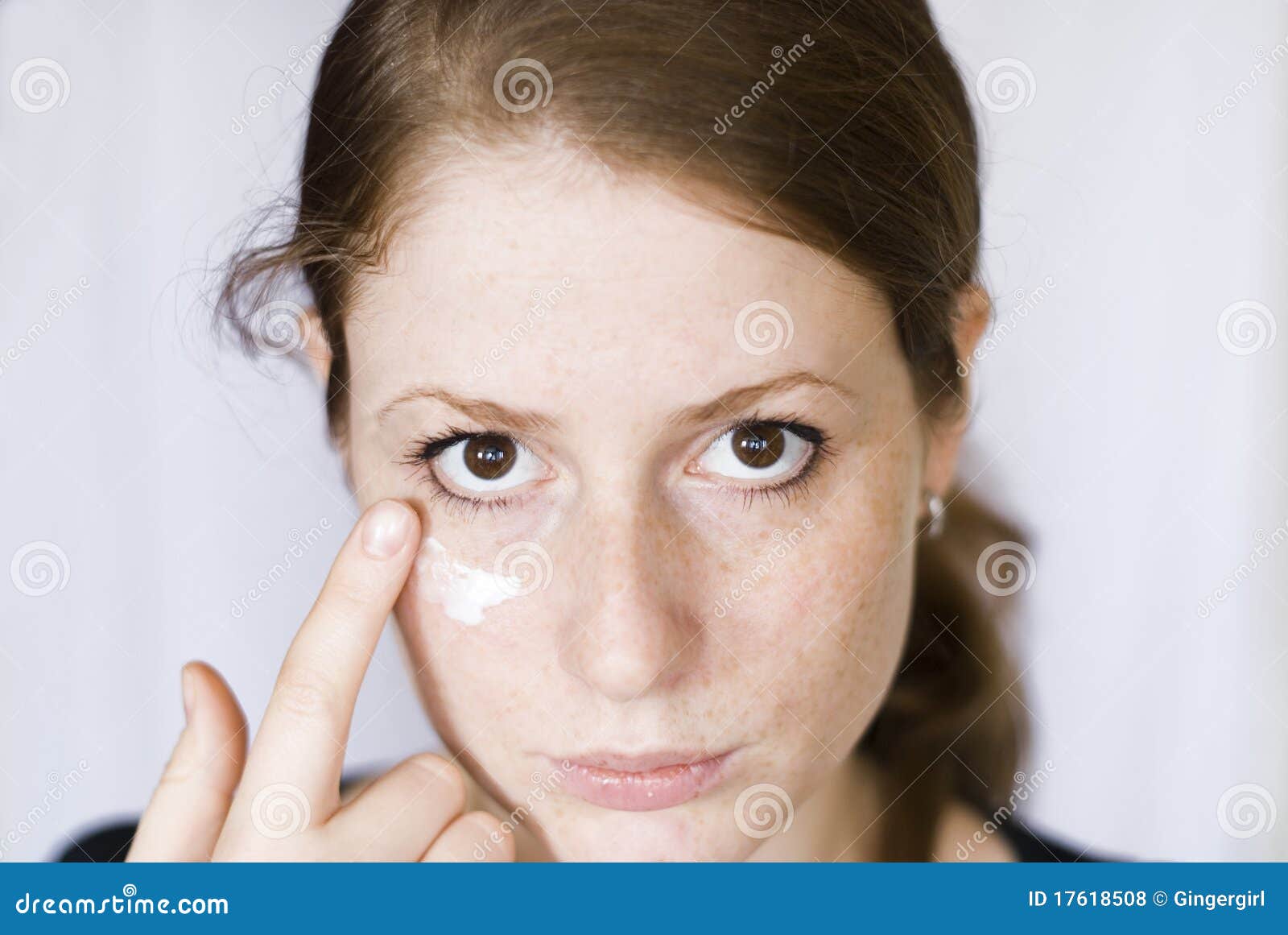 Girl with face cream stock photo. Image of skin, redhead 17618508