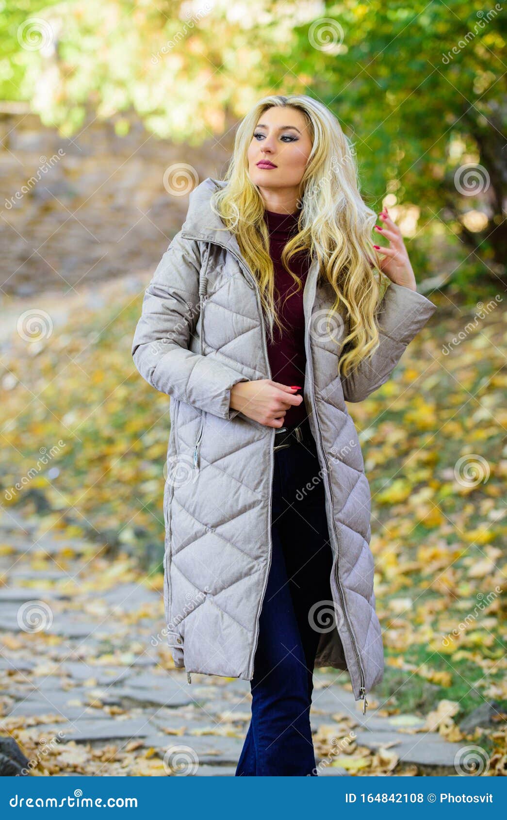 Girl Fashionable Blonde Walk in Autumn Park. Woman Wear Warm Grey ...