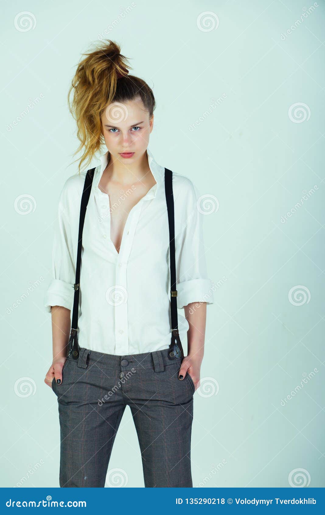 Girl in Fashionable Pants, Suspenders and Shirt Stock Photo - Image of ...