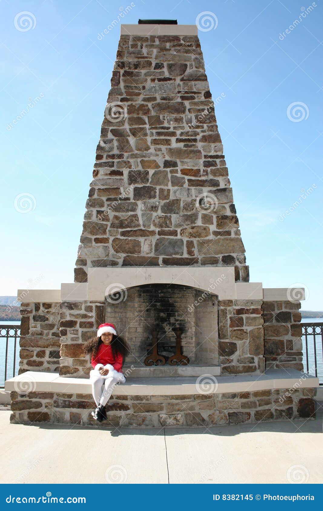 Girl and fireplace stock image. Image of posed, child 8382145