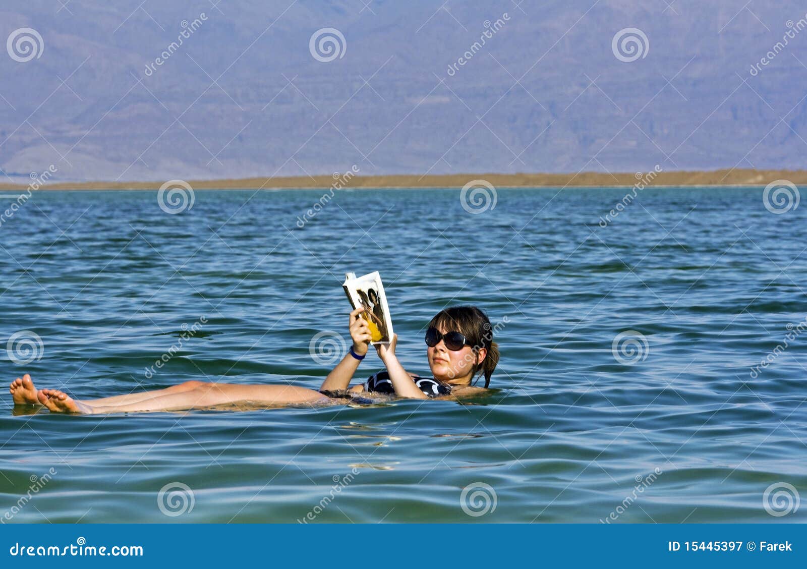 girl floating at the dead sea