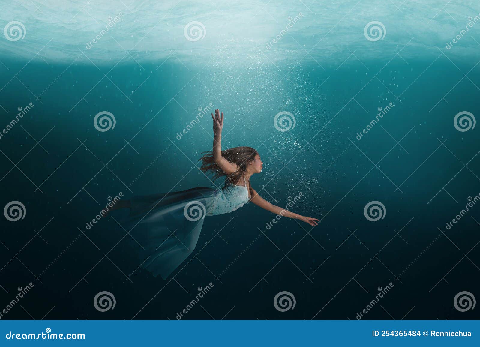 Girl Floating Underwater in a Surreal Dreamlike State Stock Photo ...