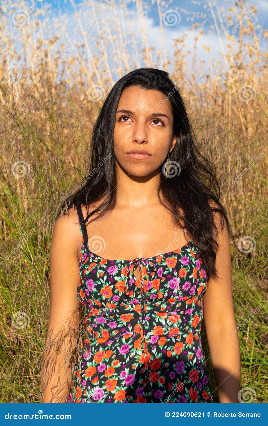 Girl With A Floral Dress Looking Up In Tall Grass Stock Image Image Of Pretty Girl 224090621