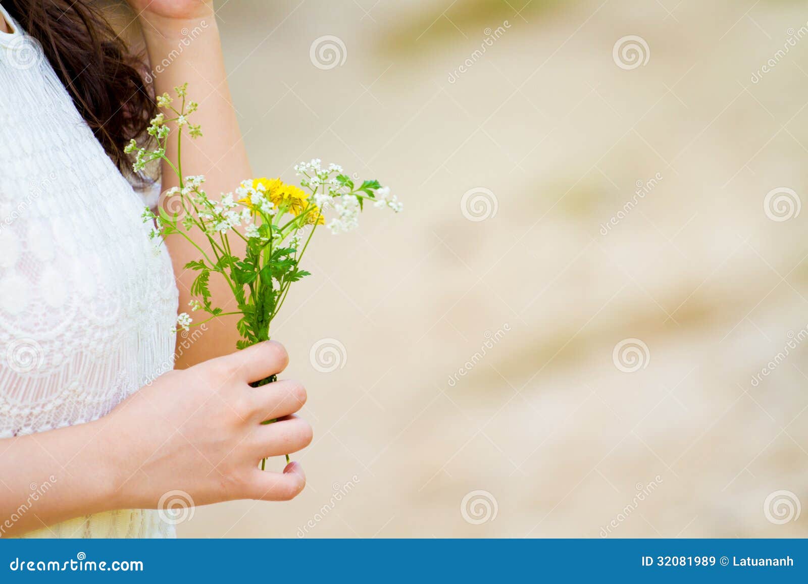 girl flower her hand long hair hold waiting someone 32081989