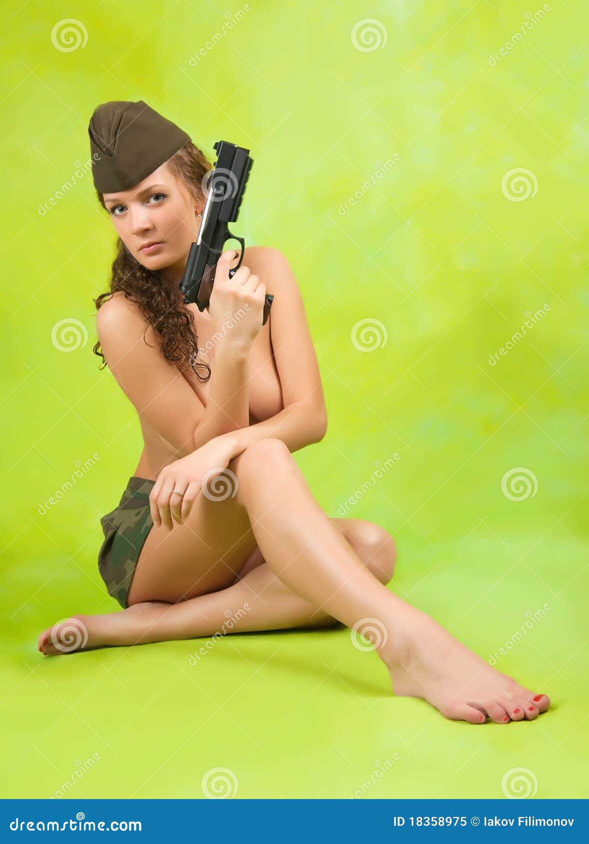 Topless Women Shooting Guns