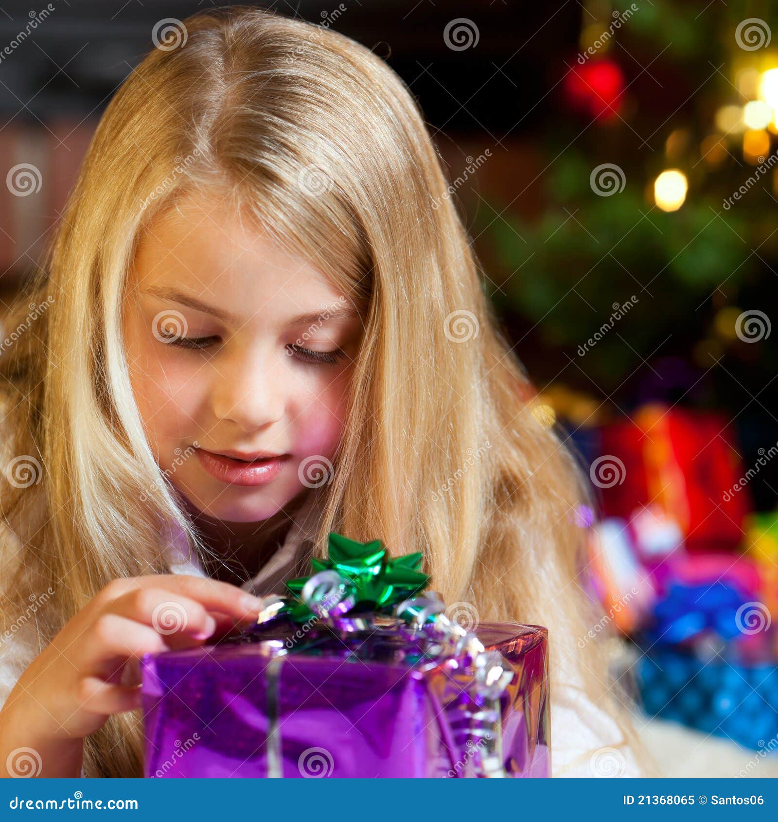 Girl with Gift before Christmas Tree Stock Image Image of christmas