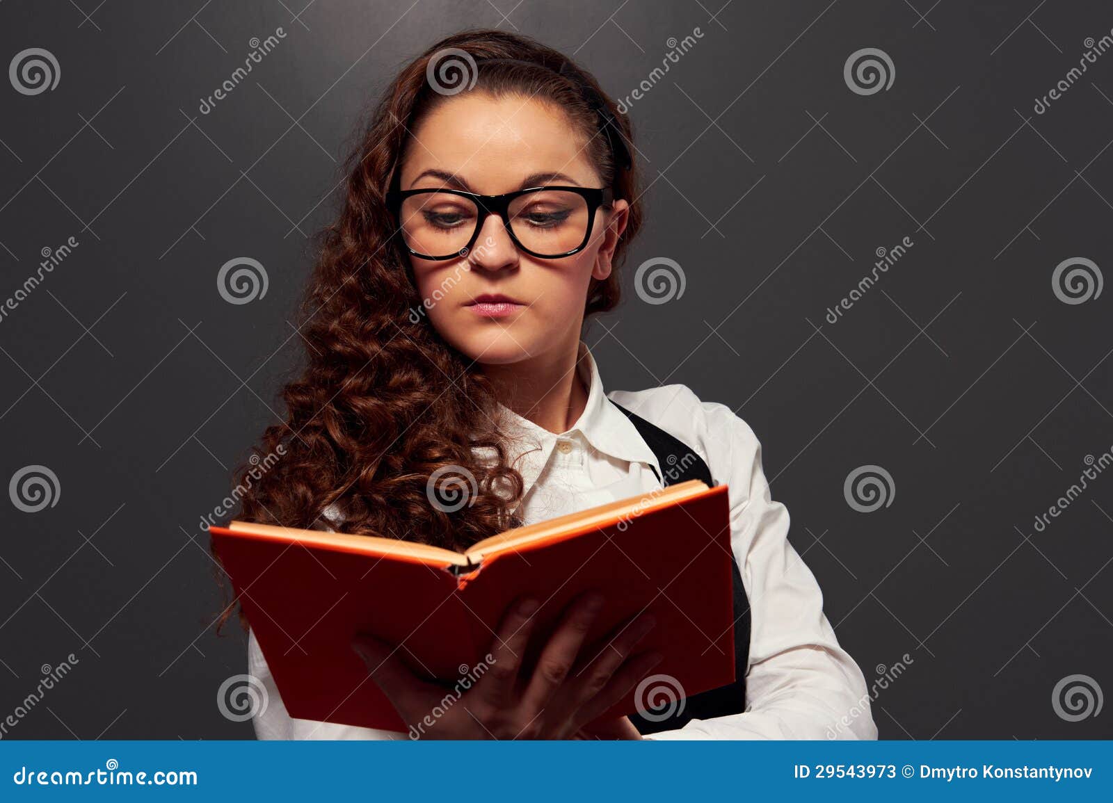 Girl in Glasses Holding Book and Reading Stock Image Image of book
