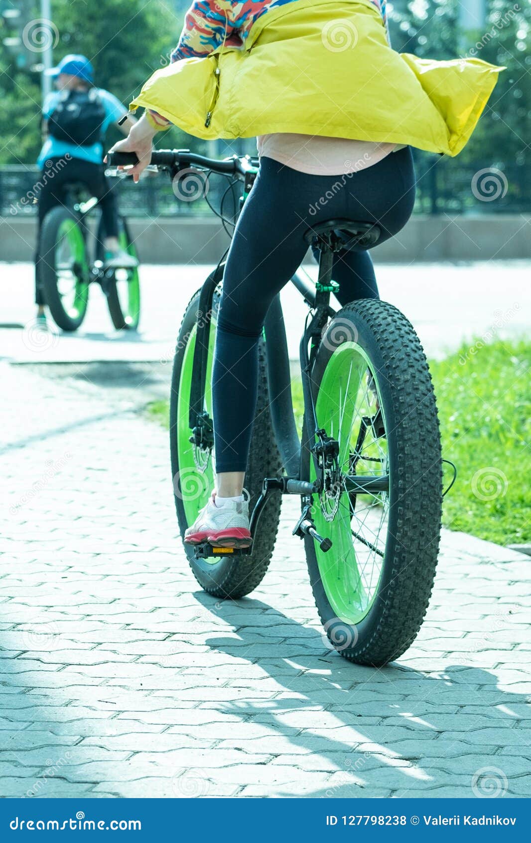 Girl Goes Bicycle Big Wheels Stock Photos Free & RoyaltyFree Stock Photos from Dreamstime
