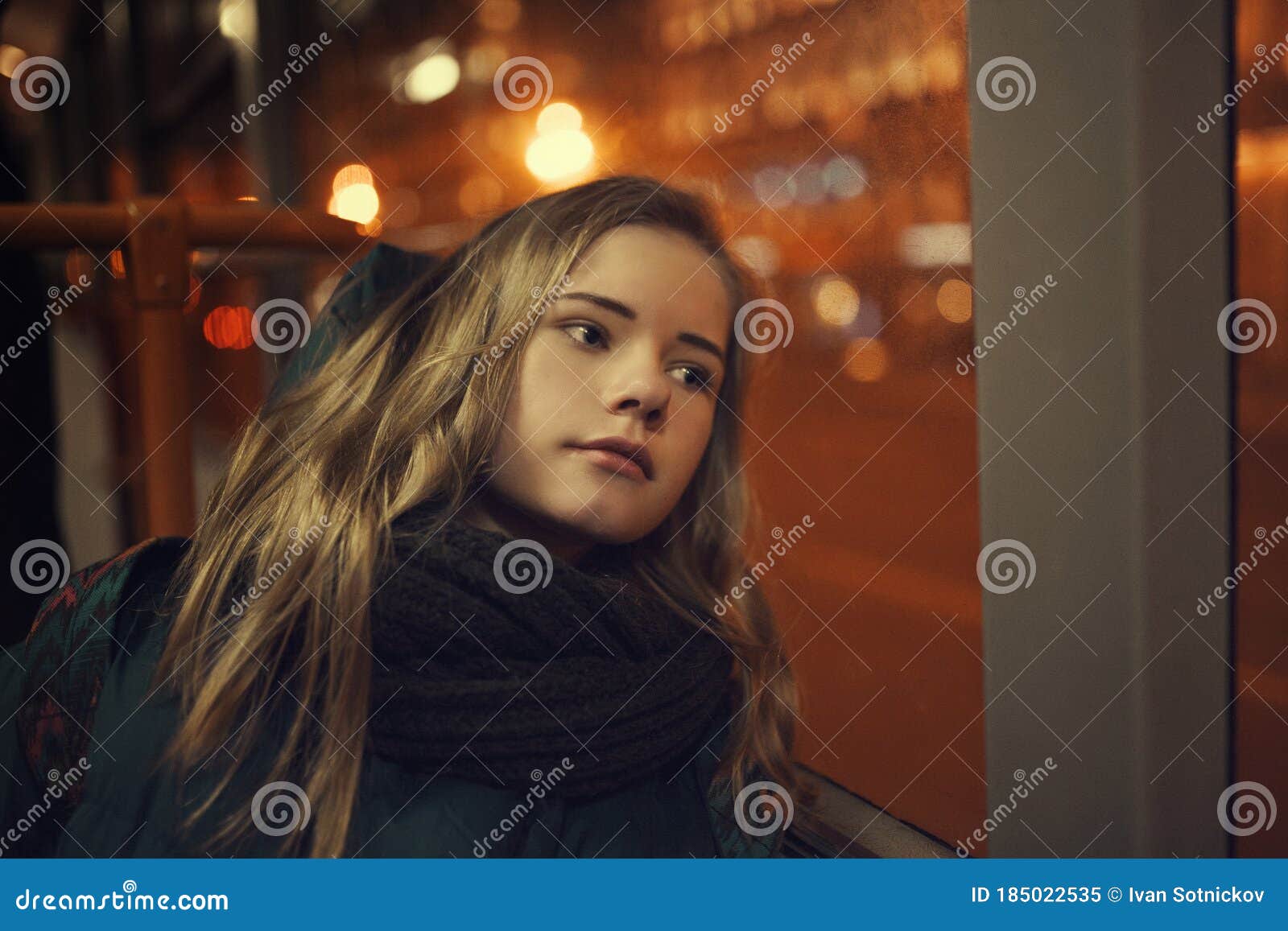 The Girl Goes on the Bus and Sits at the Window Behind Which the Night ...