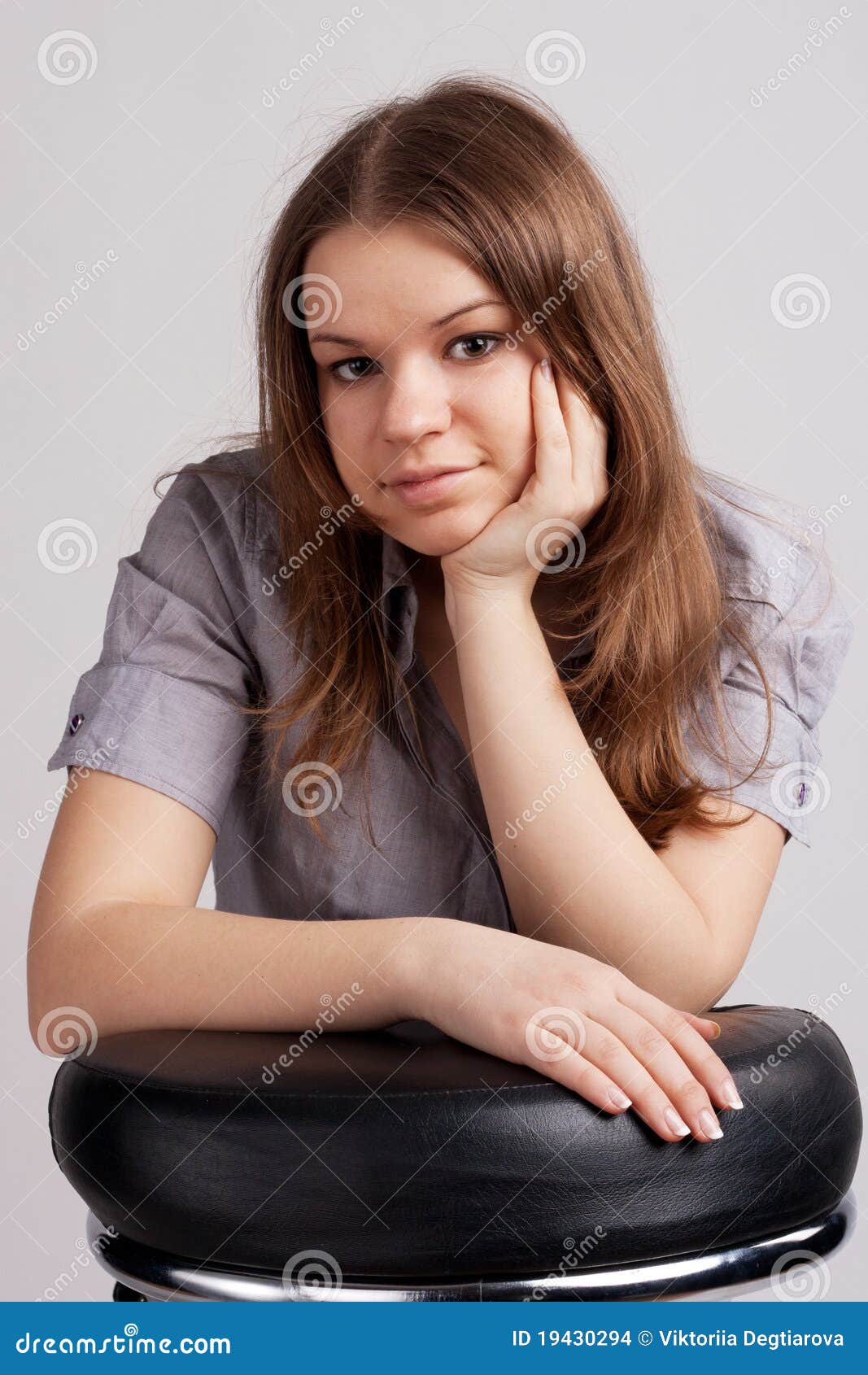 A girl in a gray shirt stock photo. Image of white, teenager - 19430294