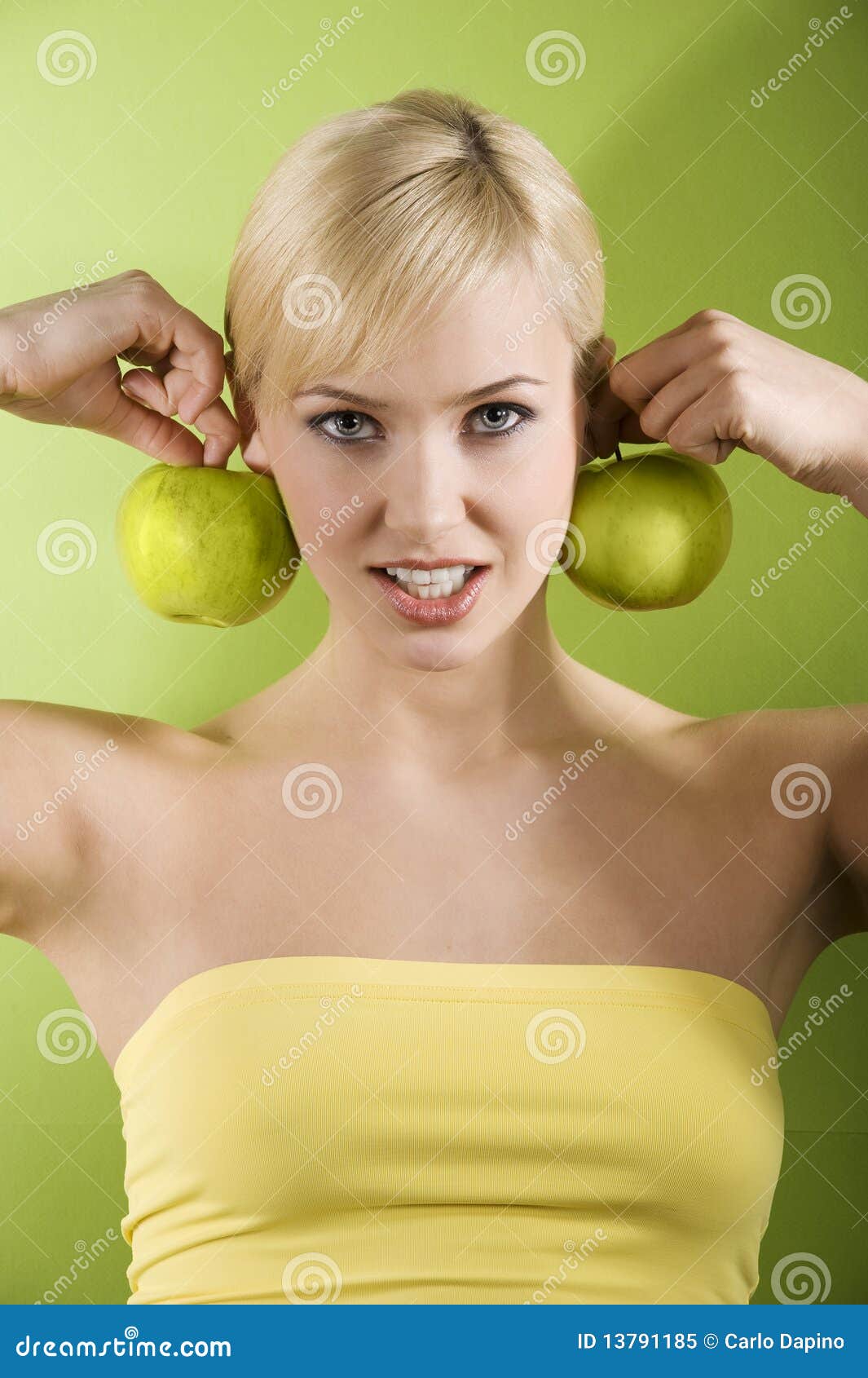 The girl with green apple stock image. Image of face - 13791185