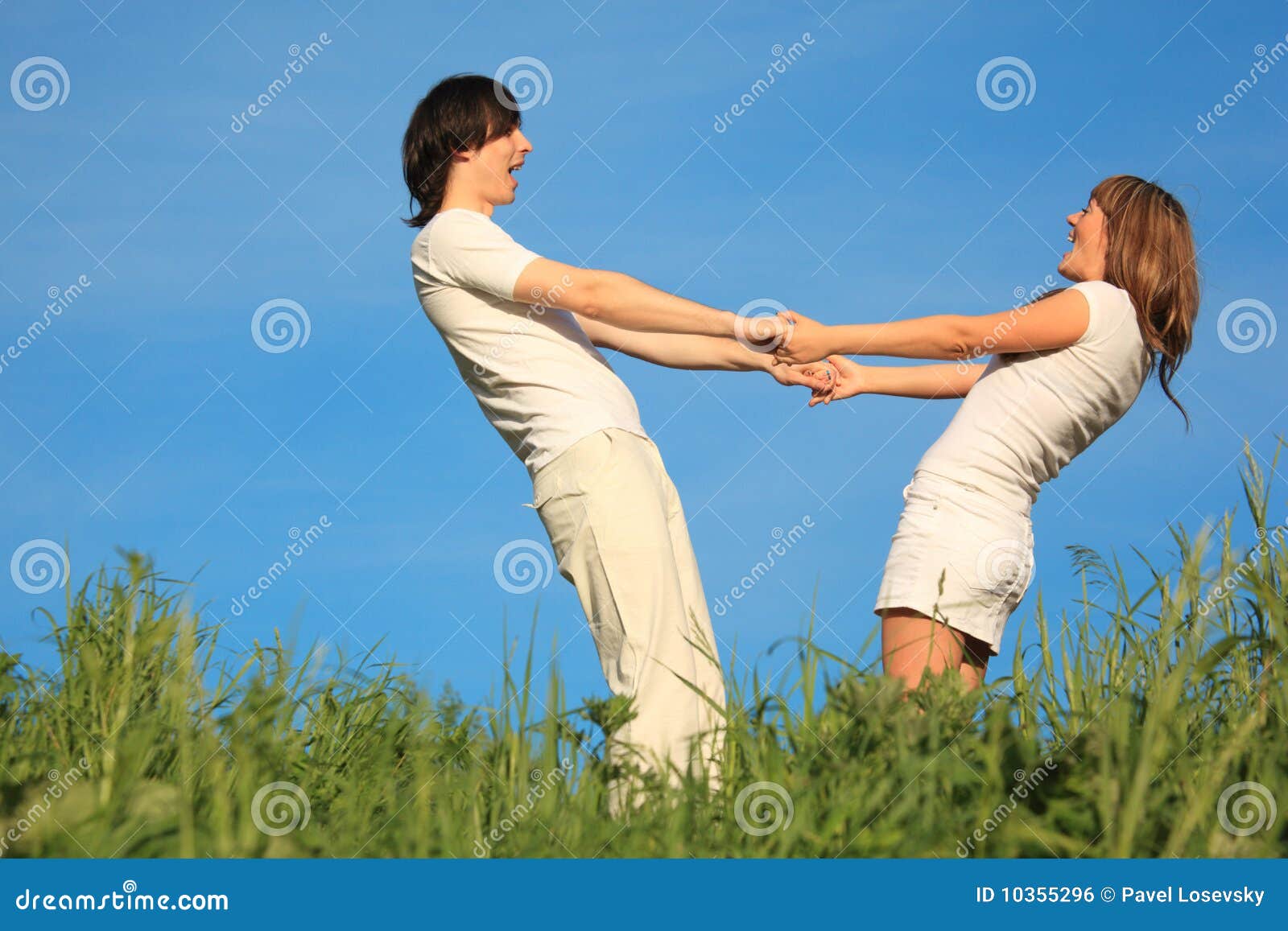 Girl and Guy Stand Having Joined Hands Stock Photo Image of