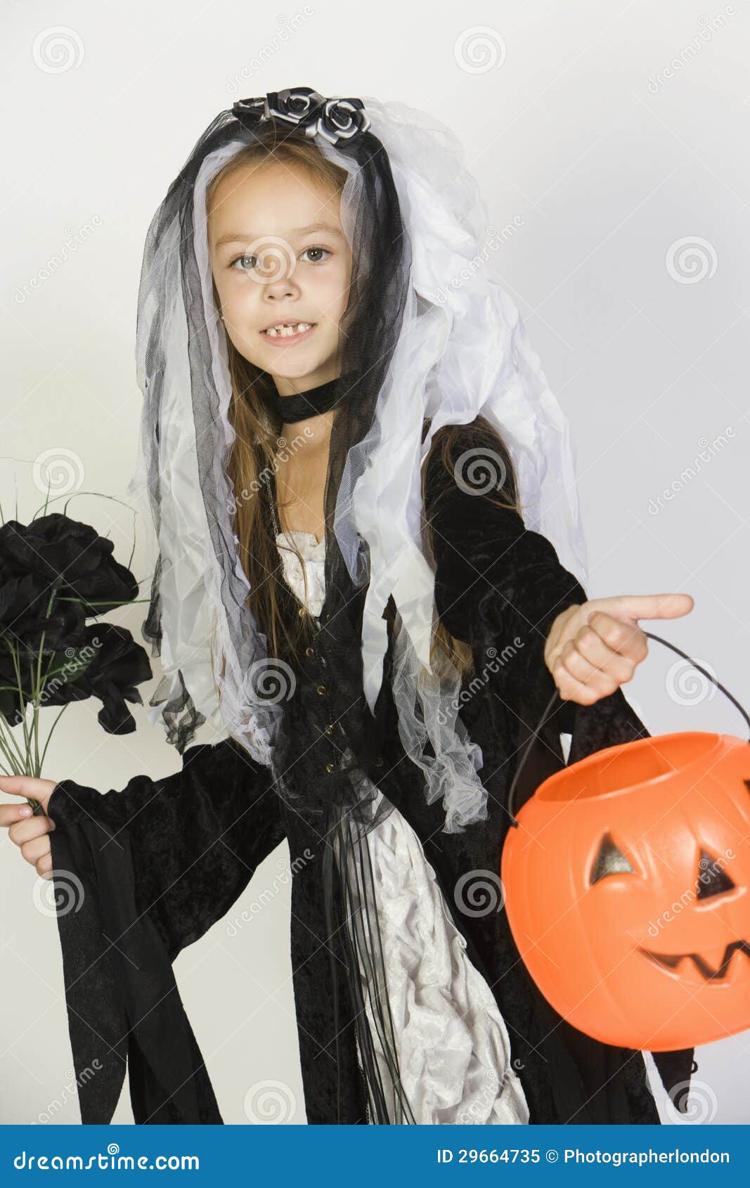 Girl in Halloween Outfit Holding Pumpkin Lantern Stock Image - Image of ...