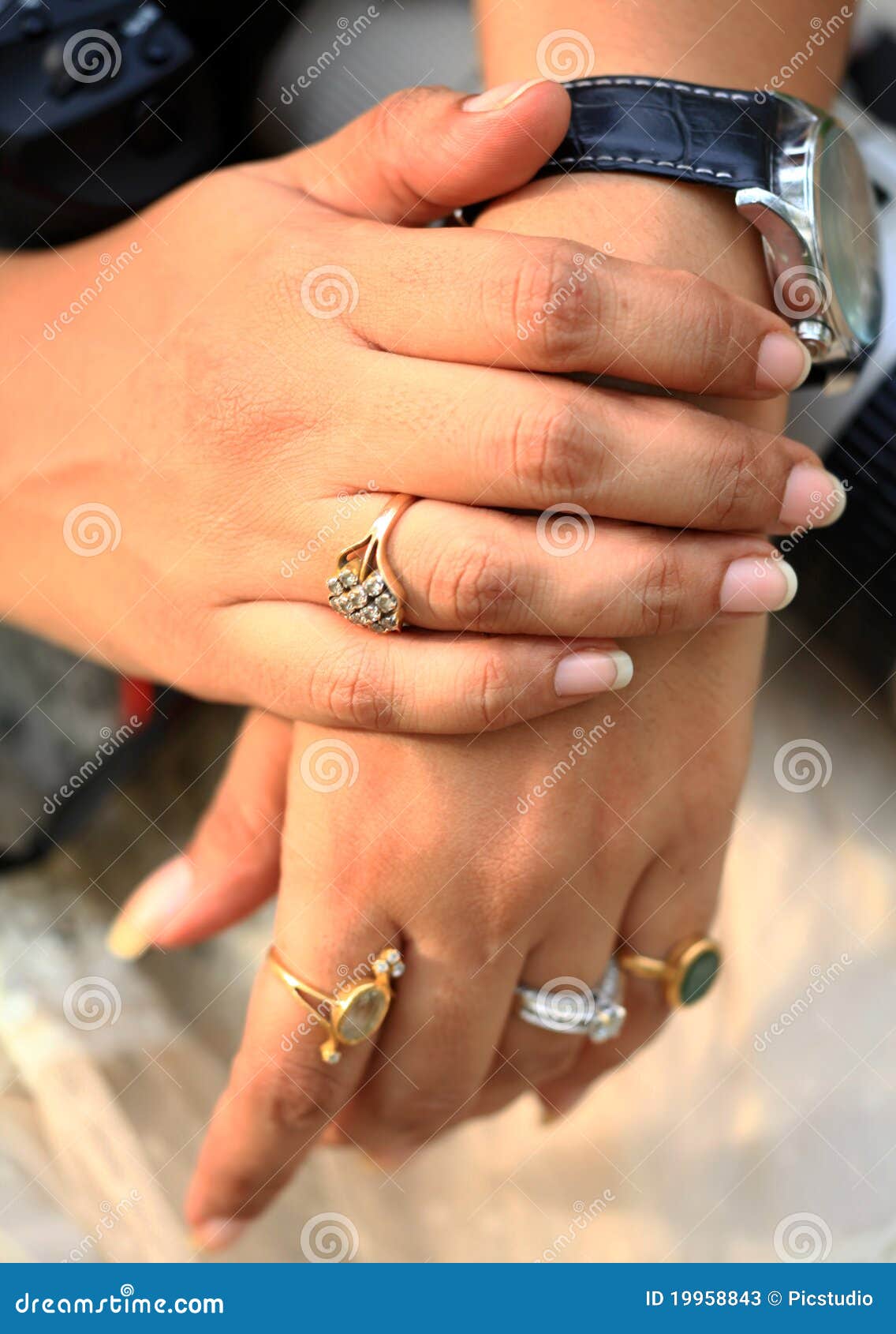 Hand wearing elegant golden ring in the shape of the lotus Stock Photo -  Alamy
