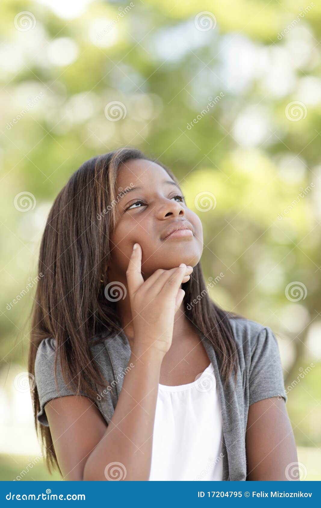 Girl with hand on face stock image. Image of young, cute 17204795