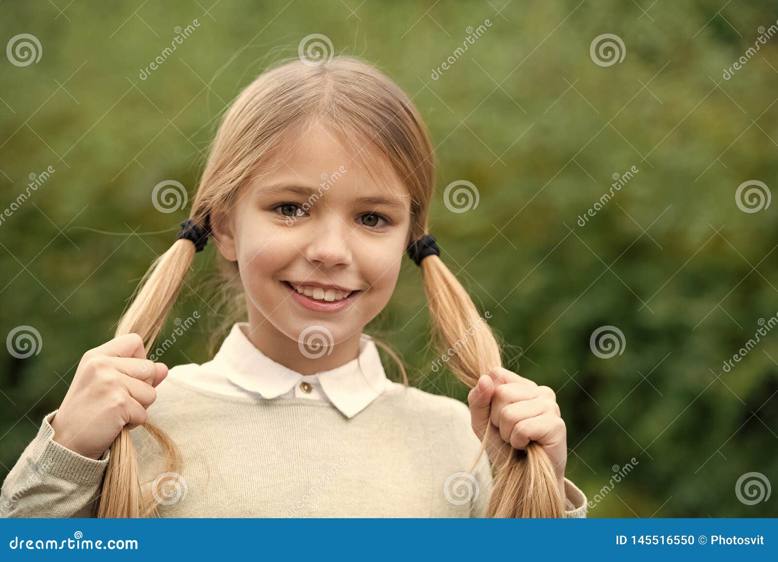 Girl Happy Smile with Blond Hair Ponytails on Green Nature Background.  Hairstyle for Cute Schoolgirl Stock Photo - Image of nature, create:  145516550