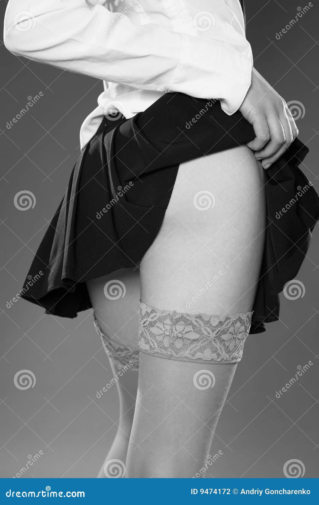 girl has lifted up a skirt