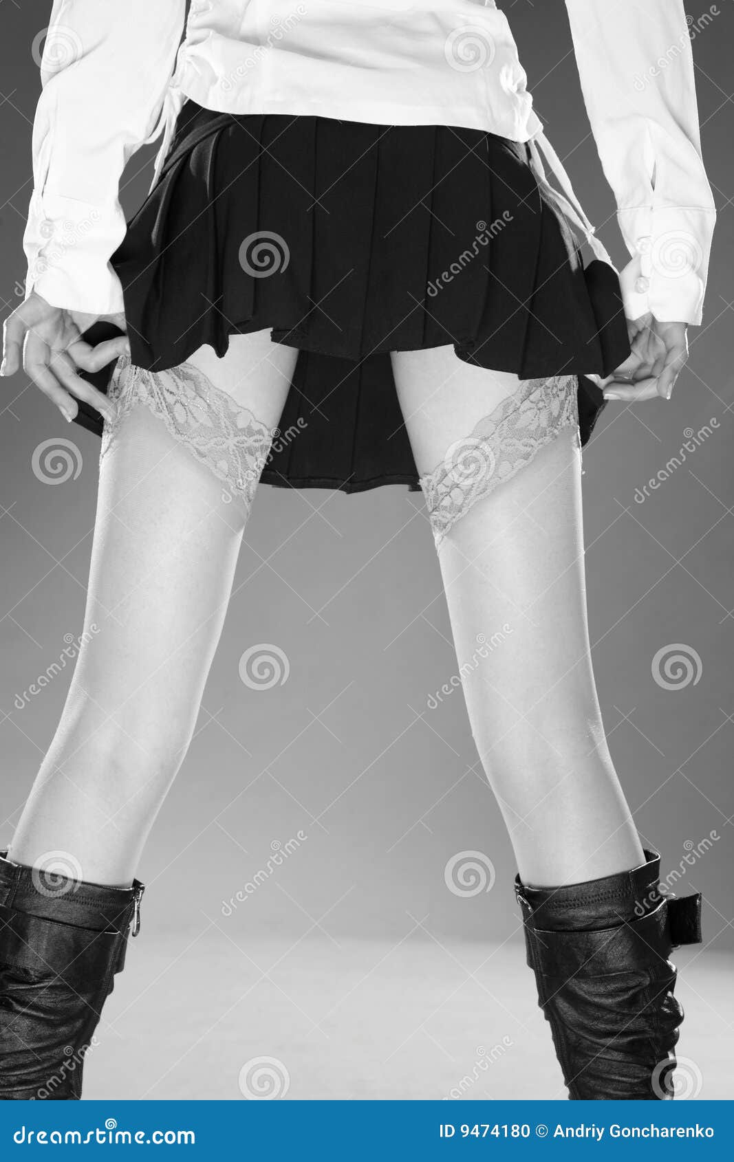 girl has lifted up a skirt