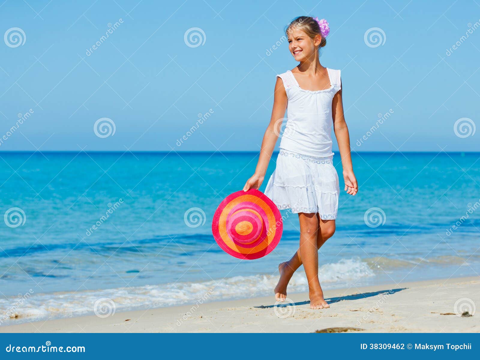 Girl with hat on the beach stock photo. Image of beautiful 38309462