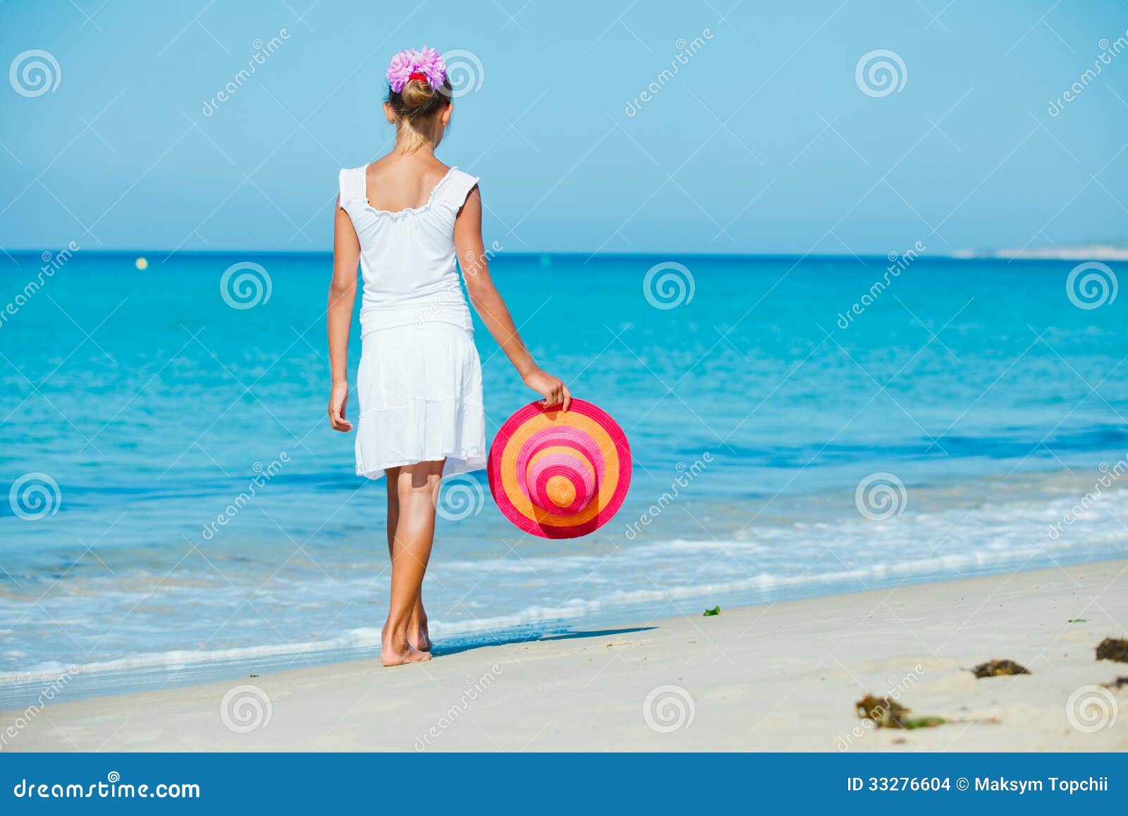 Girl with hat on the beach stock photo. Image of girl 33276604